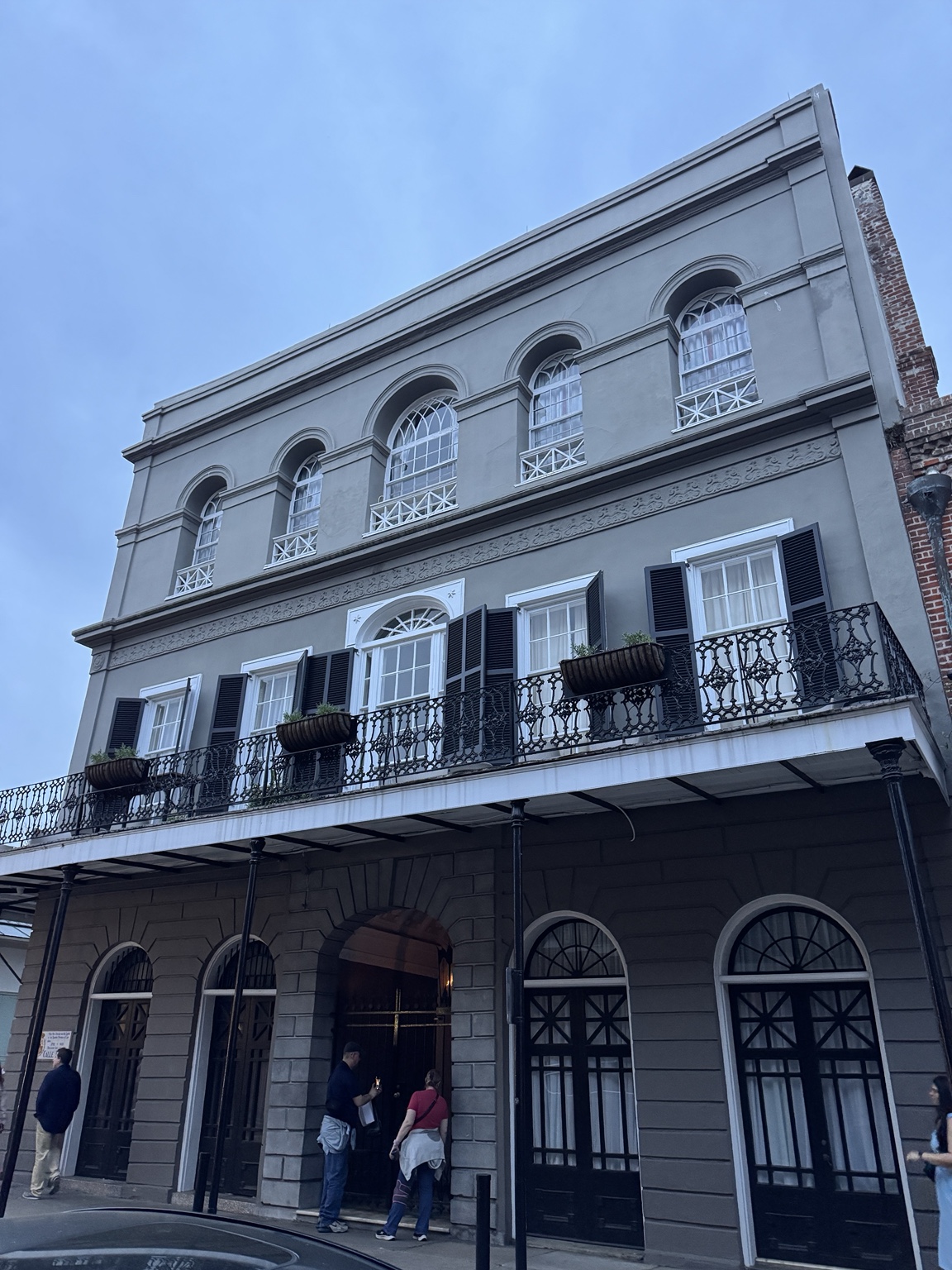 Historic building with wrought-iron balconies in the French Quarter