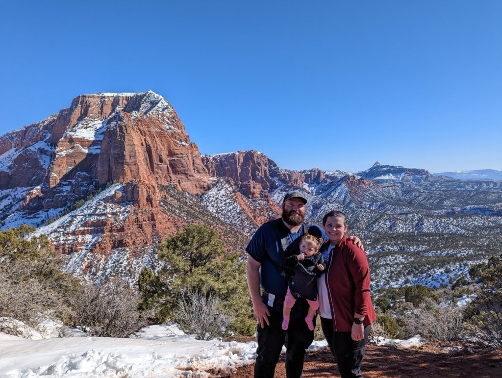 Family portrait at a snowy Zion National Park overlook