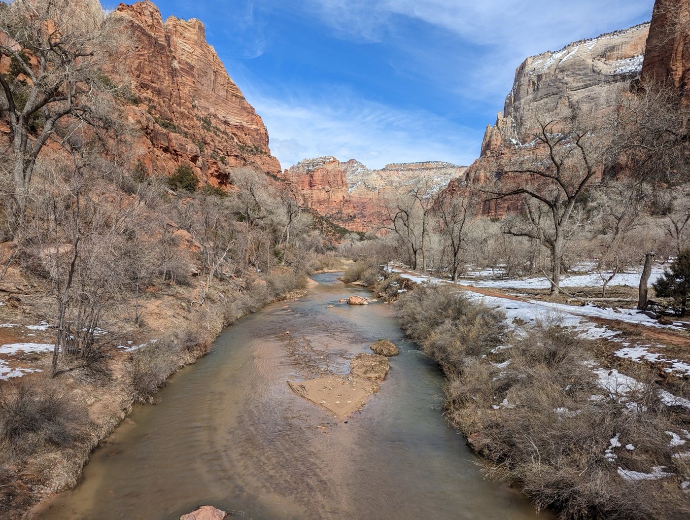 Virgin River winding between Zion Canyon cliffs in winter