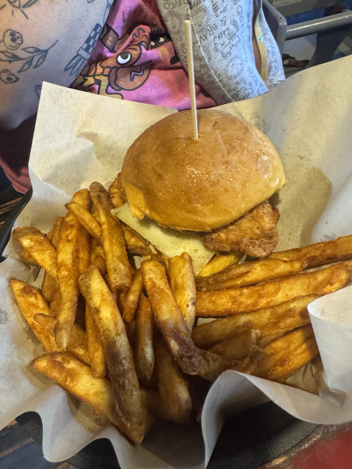 Chicken sandwich with cheese and fries at Chubby’s