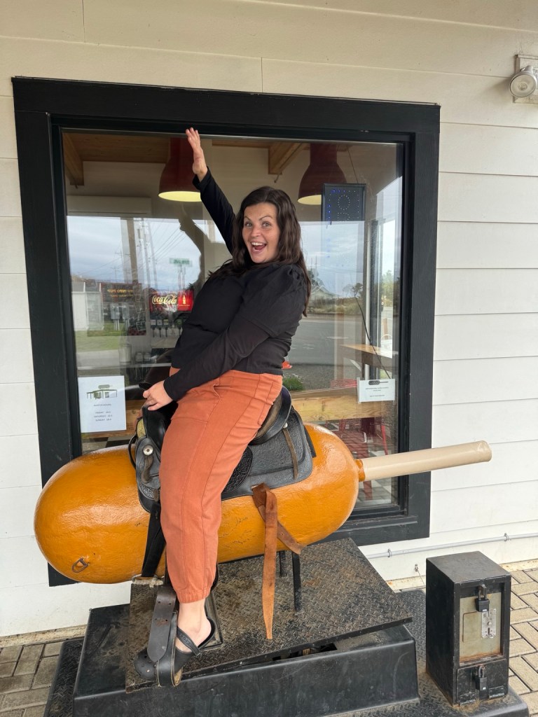 Riding the giant corn dog at Pronto Pup in Rockaway Beach